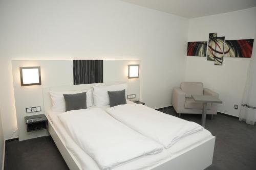 Imagen de la habitación del Hotel Weber Mannheim. Foto 20
