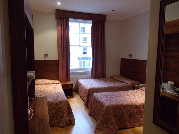 Imagen de la habitación del Hotel Wedgewood. Foto 5