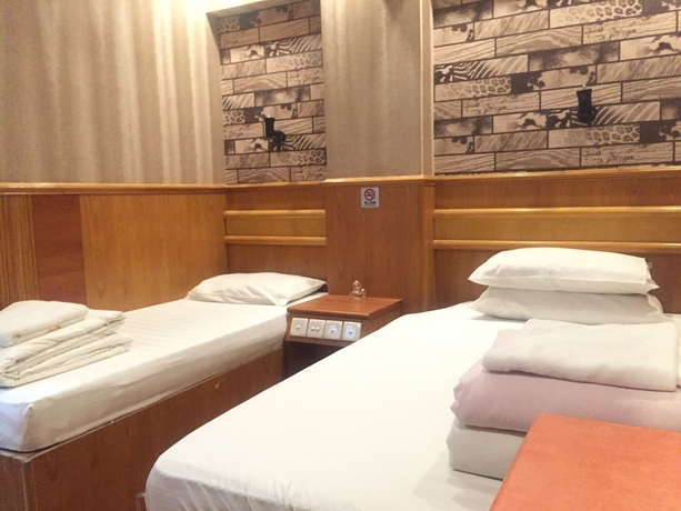 Imagen de la habitación del Hotel Wee. Inn. Foto 7