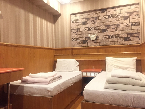 Imagen de la habitación del Hotel Wee. Inn. Foto 10