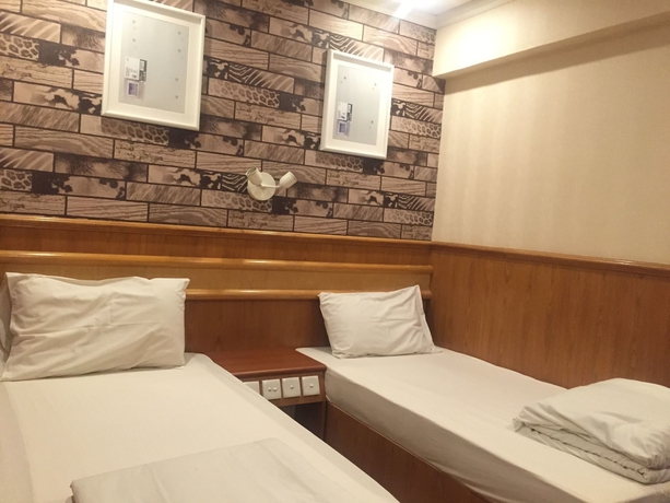 Imagen de la habitación del Hotel Wee. Inn. Foto 14