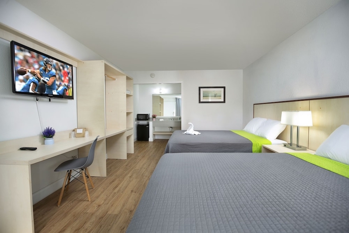 Imagen de la habitación del Hotel Weekly Inn. Foto 9