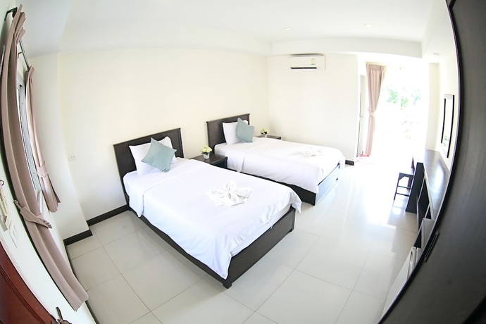 Imagen de la habitación del Hotel Weerawan Place. Foto 4