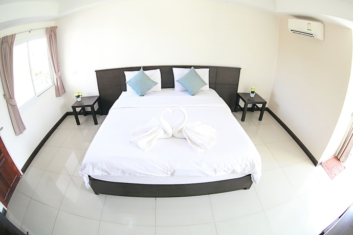 Imagen de la habitación del Hotel Weerawan Place. Foto 6