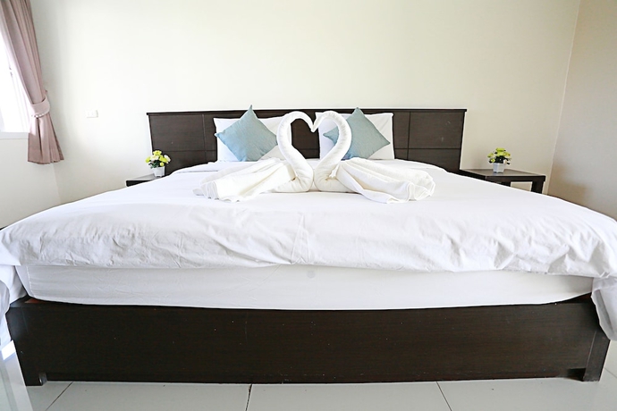 Imagen de la habitación del Hotel Weerawan Place. Foto 11