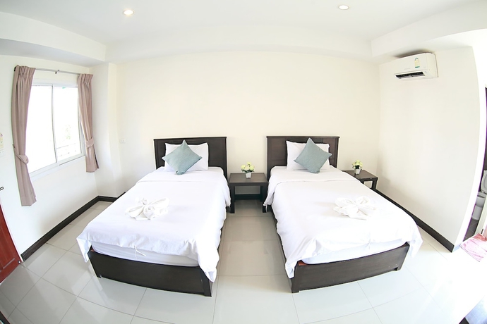 Imagen de la habitación del Hotel Weerawan Place. Foto 12