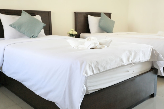 Imagen de la habitación del Hotel Weerawan Place. Foto 13