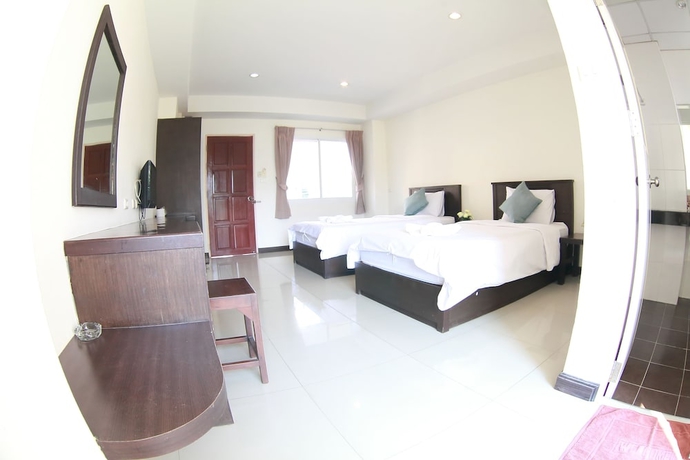 Imagen de la habitación del Hotel Weerawan Place. Foto 14