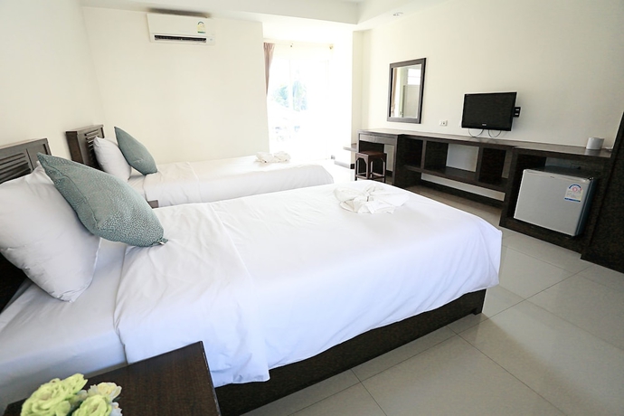 Imagen de la habitación del Hotel Weerawan Place. Foto 15