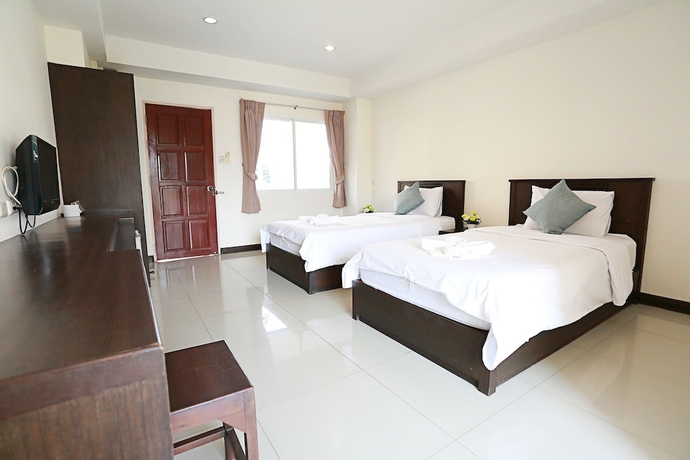 Imagen de la habitación del Hotel Weerawan Place. Foto 16