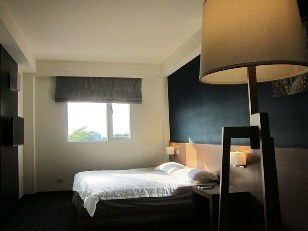 Imagen de la habitación del Hotel Wefun Inn. Foto 19