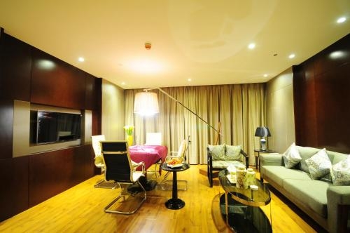 Imagen de la habitación del Hotel Wei Shang. Foto 9