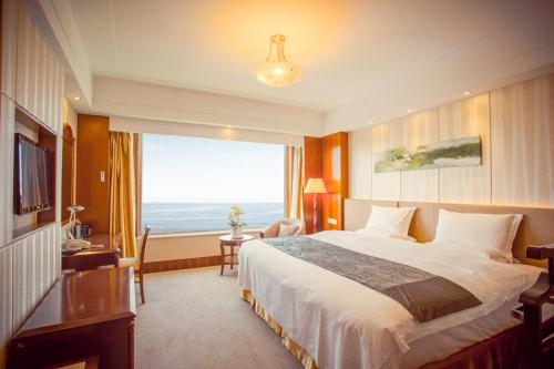 Imagen de la habitación del Hotel Weihai Golden Bay Resort Hotel. Foto 3