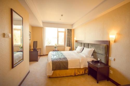 Imagen de la habitación del Hotel Weihai Golden Bay Resort Hotel. Foto 5