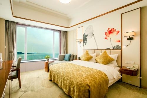 Imagen de la habitación del Hotel Weihai Golden Bay Resort Hotel. Foto 6