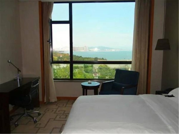 Imagen de la habitación del Hotel Weihai Guishe Fourseasons. Foto 6