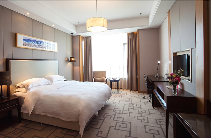 Imagen de la habitación del Hotel Weihai Guishe Fourseasons. Foto 7