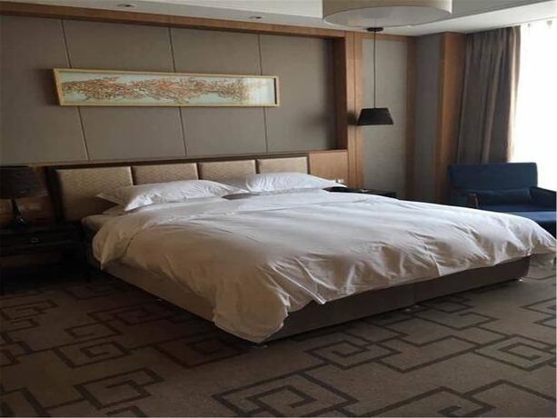 Imagen de la habitación del Hotel Weihai Guishe Fourseasons. Foto 8