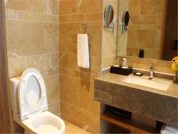 Imagen de la habitación del Hotel Weihai Guishe Fourseasons. Foto 15
