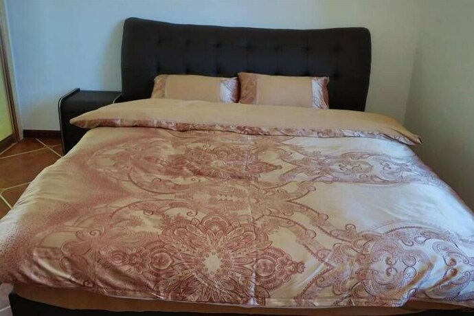 Imagen de la habitación del Hotel Weihai Haina Holiday Apartment. Foto 12