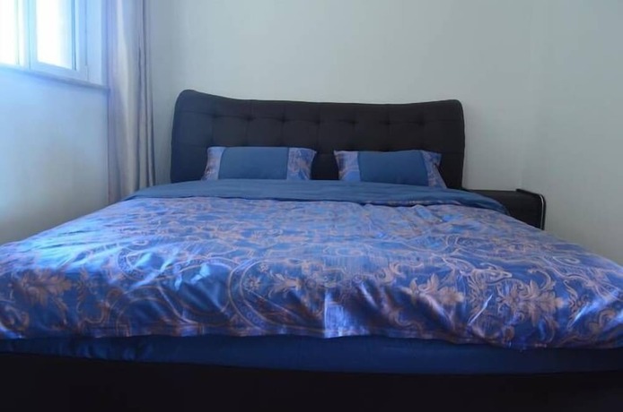Imagen de la habitación del Hotel Weihai Haina Holiday Apartment. Foto 20