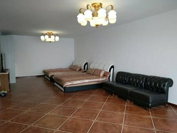 Imagen de la habitación del Hotel Weihai Haina Holiday Apartment. Foto 21