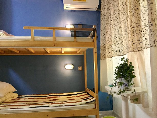 Imagen de la habitación del Hotel Weihai Hiking International Youth Hostel. Foto 13