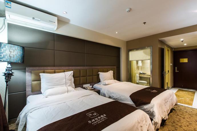 Imagen de la habitación del Hotel Weihai Huakun. Foto 7