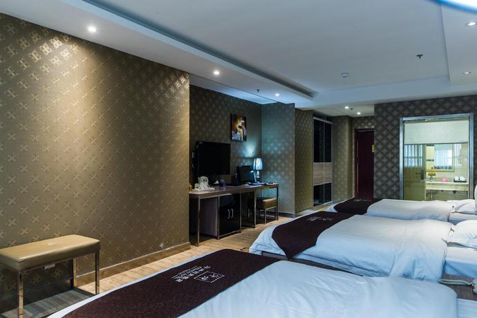 Imagen de la habitación del Hotel Weihai Huakun. Foto 8