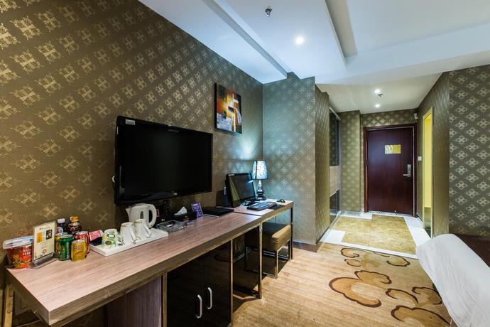 Imagen de la habitación del Hotel Weihai Huakun. Foto 9