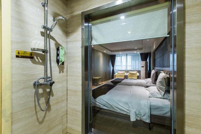 Imagen de la habitación del Hotel Weihai Huakun. Foto 10