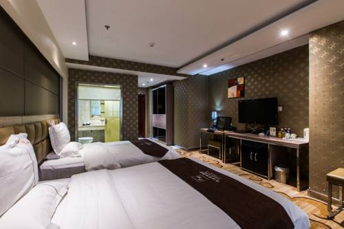 Imagen de la habitación del Hotel Weihai Huakun. Foto 11