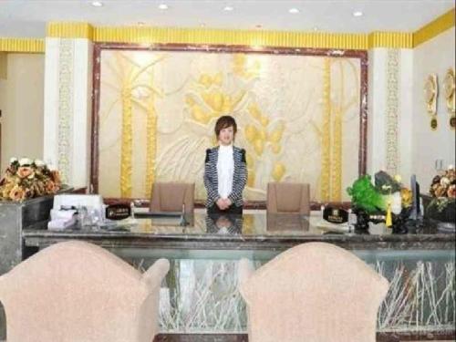 Imagen general del Hotel Weihai Huayu Business. Foto 4