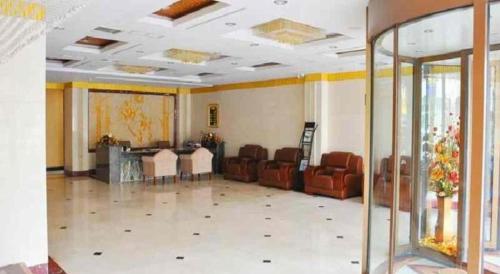 Imagen general del Hotel Weihai Huayu Business. Foto 8