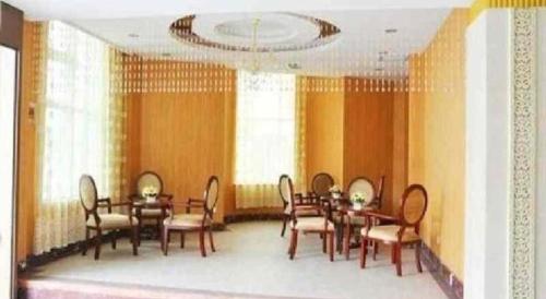 Imagen general del Hotel Weihai Huayu Business. Foto 10
