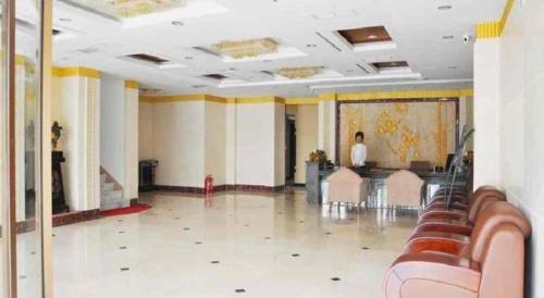 Imagen general del Hotel Weihai Huayu Business. Foto 11