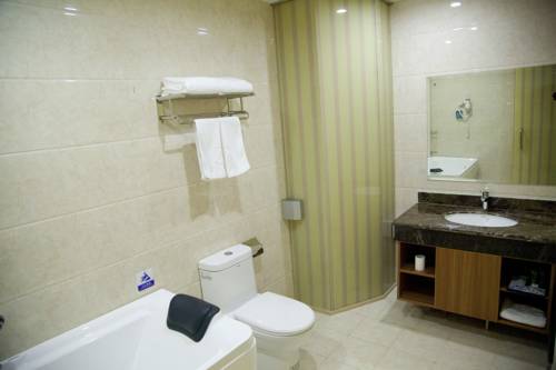 Imagen de la habitación del Hotel Weihai Lanxing Holiday. Foto 1