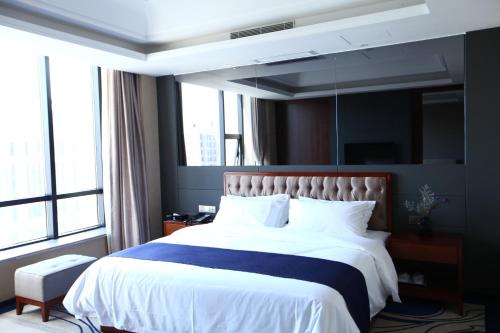 Imagen general del Hotel Weihai Long Yue International. Foto 1