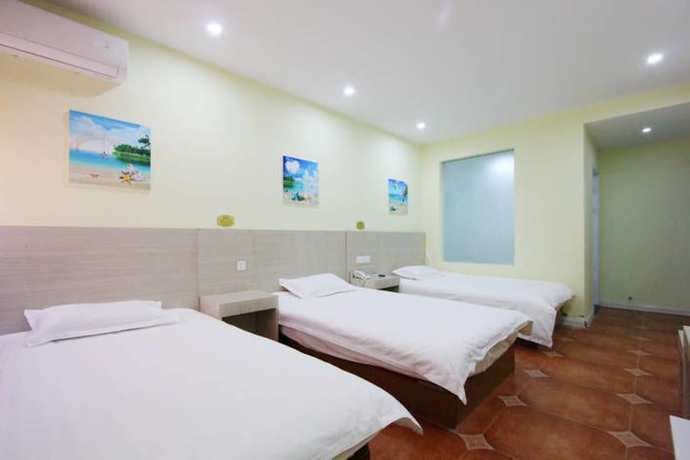 Imagen de la habitación del Hotel Weihai Mediterranean. Foto 4