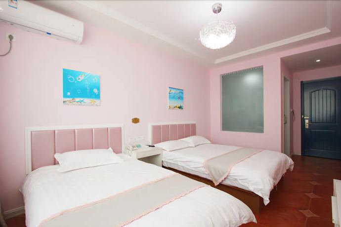 Imagen de la habitación del Hotel Weihai Mediterranean. Foto 8