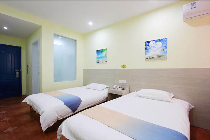 Imagen de la habitación del Hotel Weihai Mediterranean. Foto 9