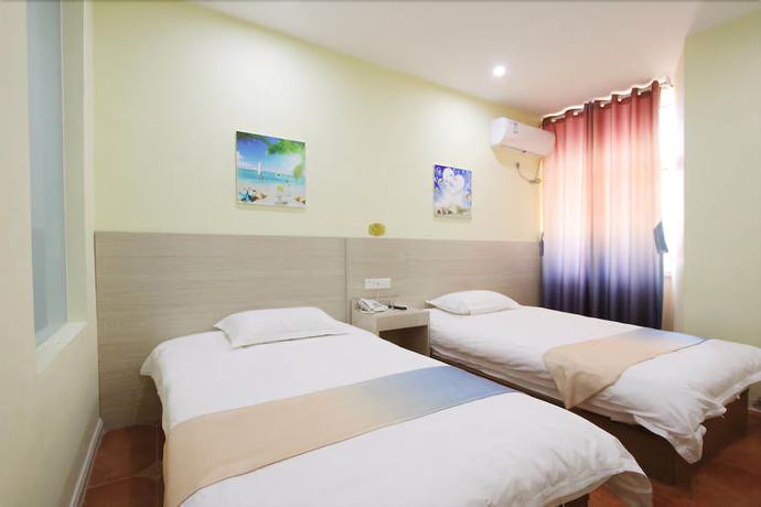 Imagen de la habitación del Hotel Weihai Mediterranean. Foto 11