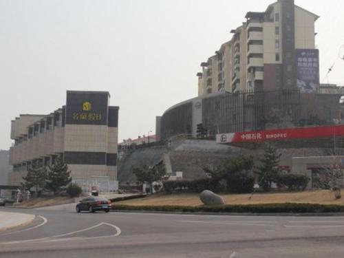 Imagen de la habitación del Hotel Weihai Ming Lan Holiday. Foto 7