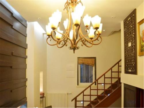Imagen de la habitación del Hotel Weihai Ming Lan Holiday. Foto 8
