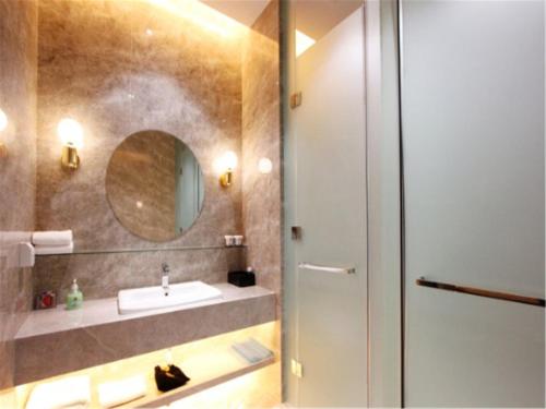 Imagen de la habitación del Hotel Weihai Qingtiwan Holiday. Foto 6