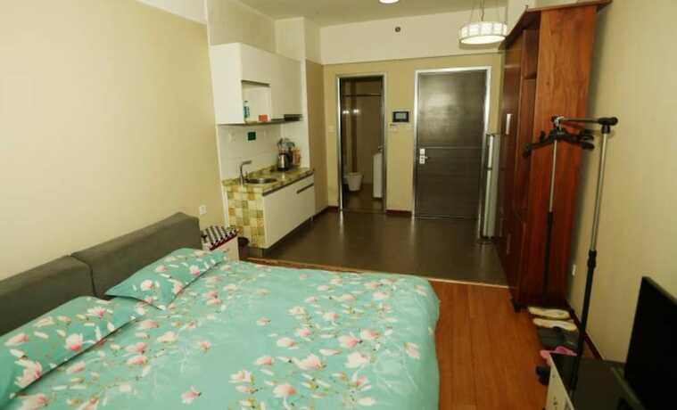 Imagen de la habitación del Hotel Weihai Suba Seaview Holiday Apartment. Foto 16