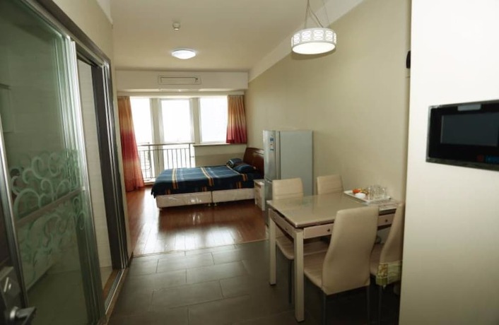 Imagen de la habitación del Hotel Weihai Suba Seaview Holiday Apartment. Foto 17