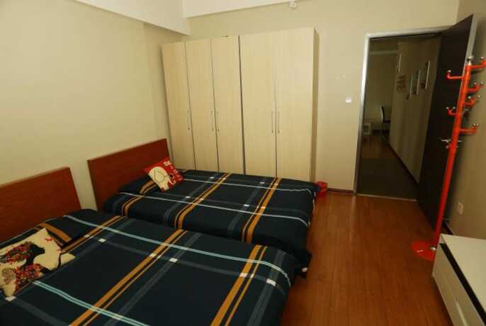 Imagen de la habitación del Hotel Weihai Suba Seaview Holiday Apartment. Foto 18