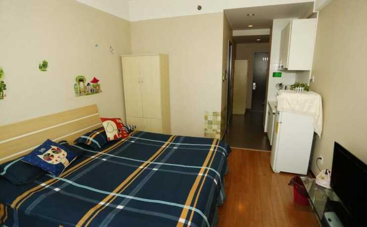 Imagen de la habitación del Hotel Weihai Suba Seaview Holiday Apartment. Foto 21