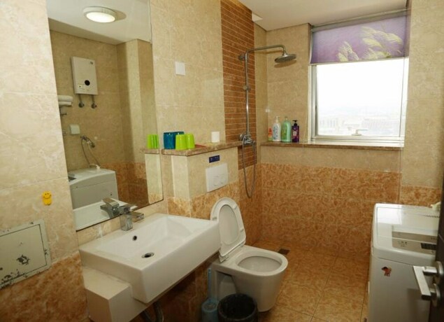 Imagen de la habitación del Hotel Weihai Suba Seaview Holiday Apartment. Foto 22